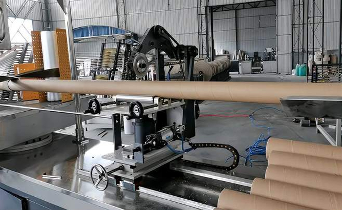 What should be noted when using a paper tube machine?